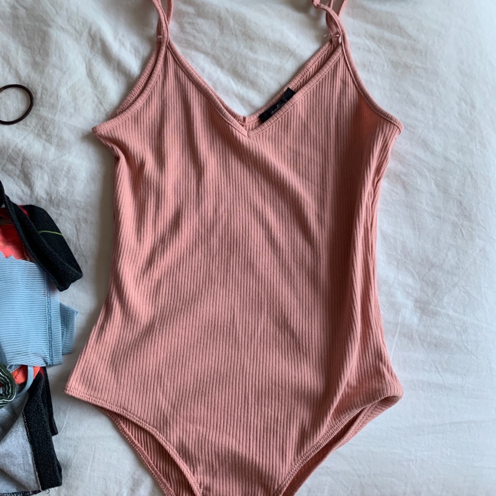 Pink ribbed body suit